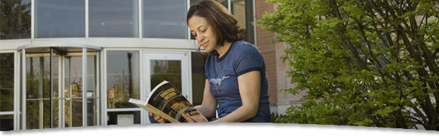 Student outside Campus Life Building