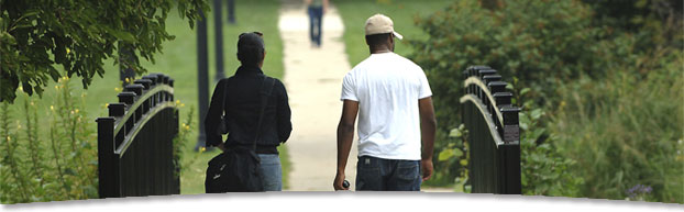 Photo of students walking near lagoon