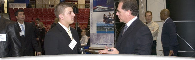 Photo of student and employer at job fair
