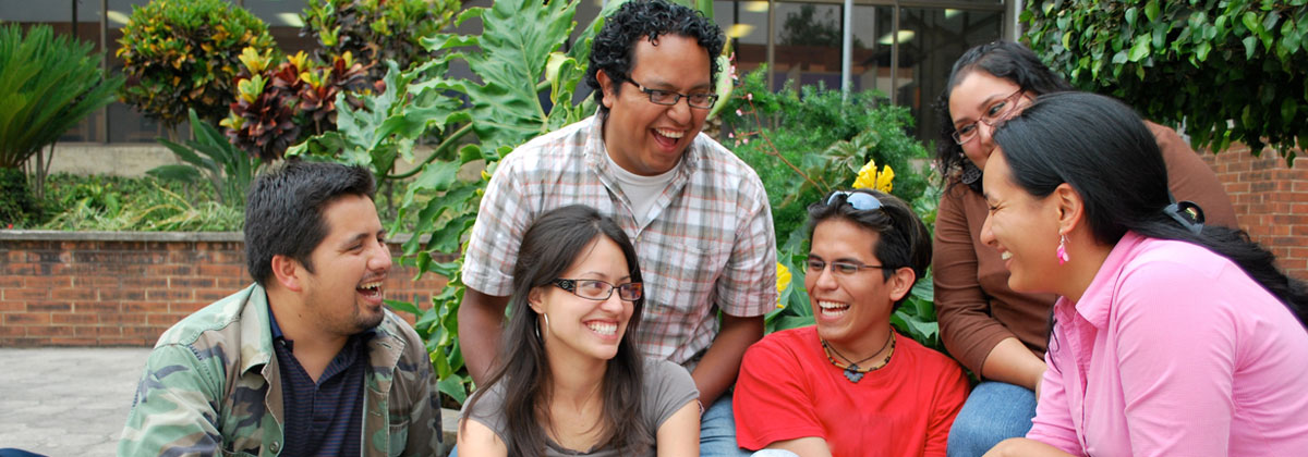 Group of laughing hispanic highschool students