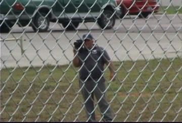 Special Response Corporation Guards taping workers