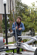 Sculptor Bruce Niemi, a 1981 NIU alum, helped to install his sculpture last week.