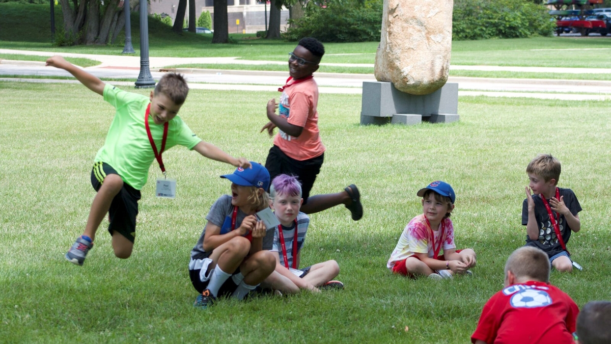 campers playing tag outside
