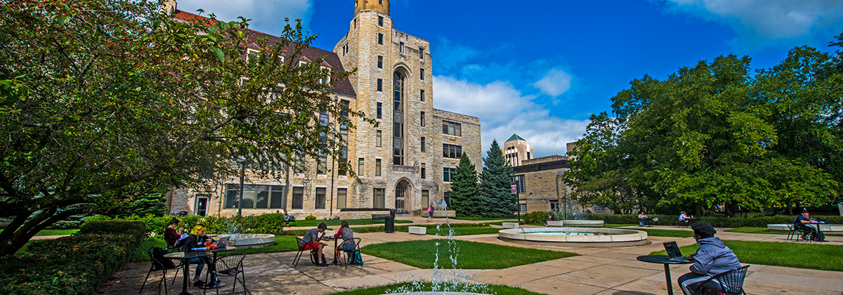 Students studying outside Davis Hall.