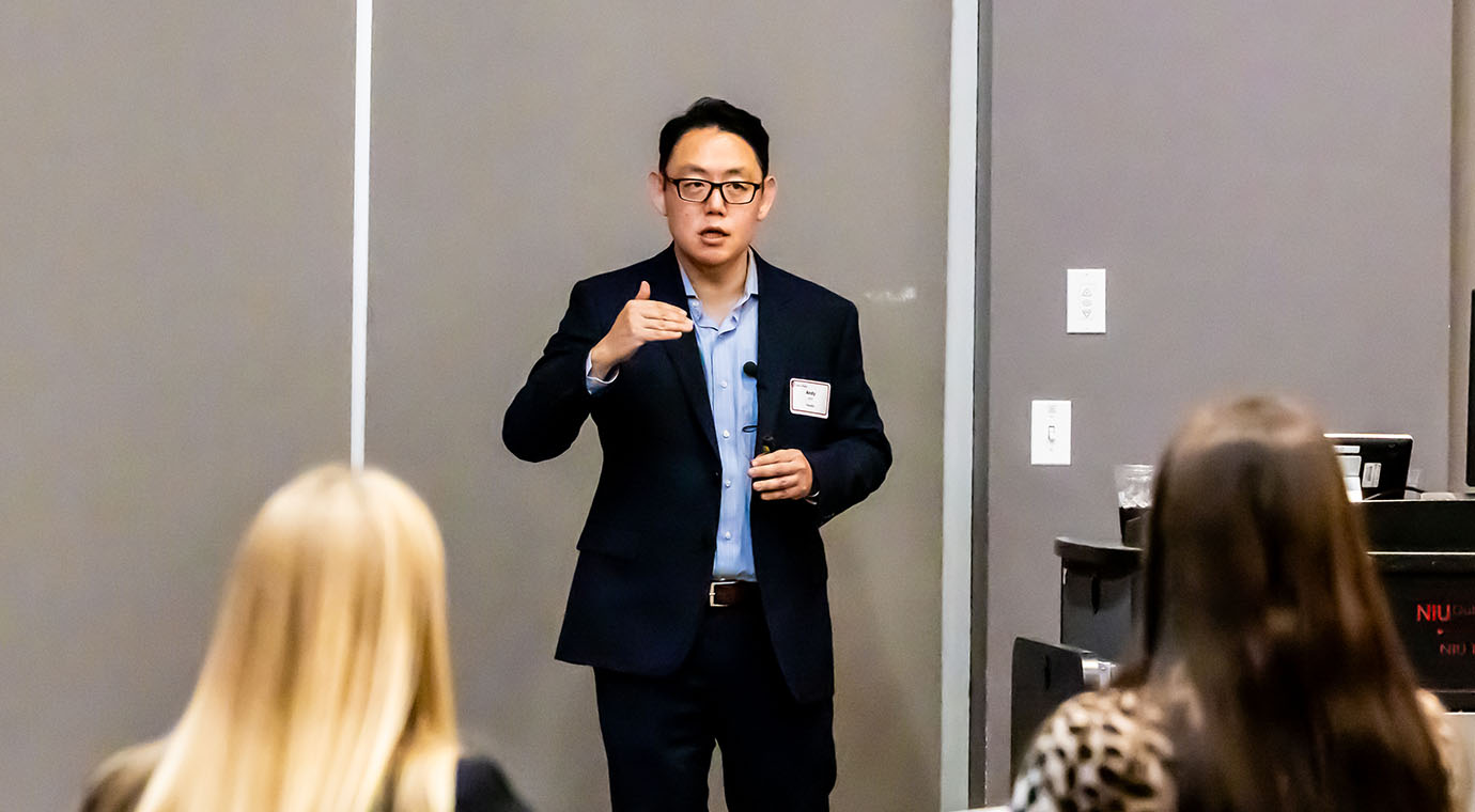 Andy Jeon presenting during marketing mixer