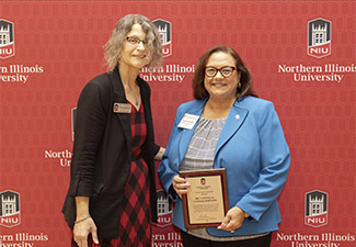Yvonne Johnson accepting Staff Mentorship Award