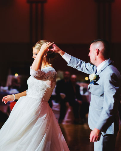 groom and bride dancing at reception