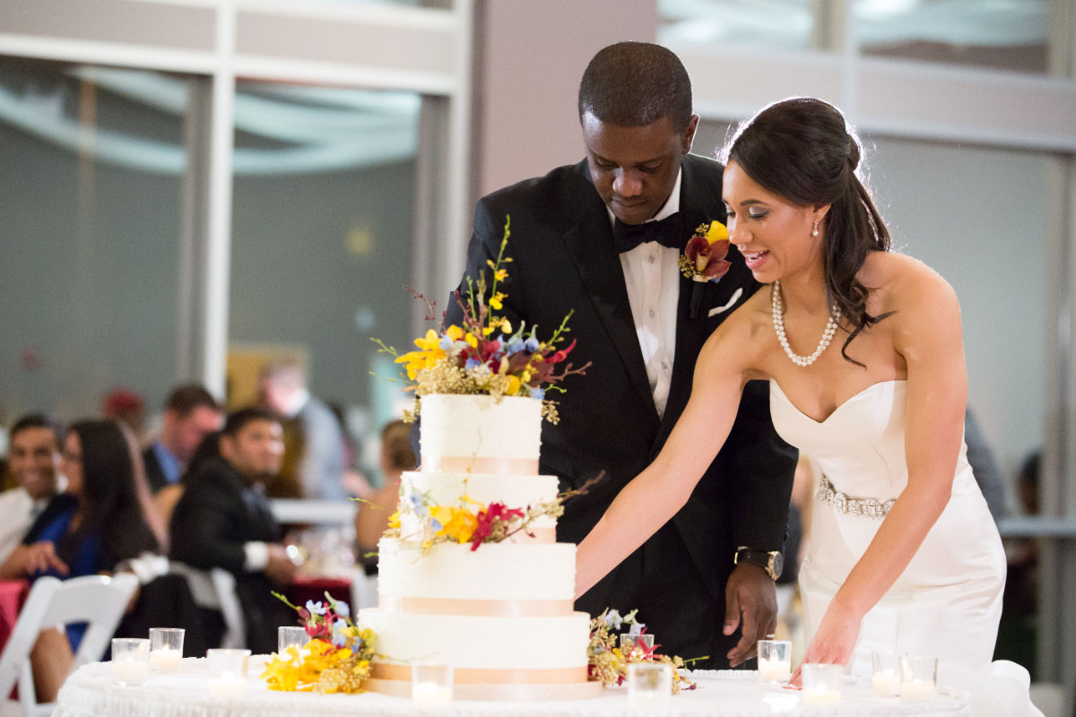 Bride and Groom cutting cake