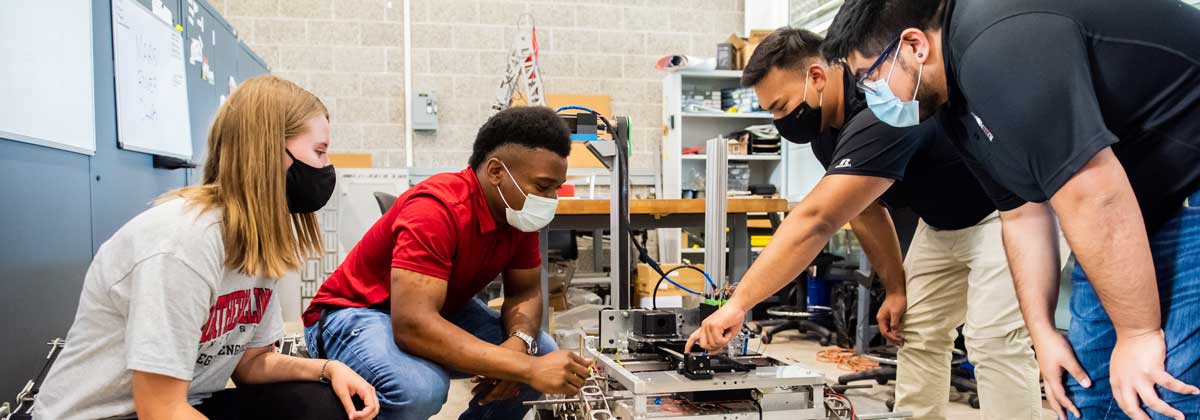 Students work on robotics in engineering