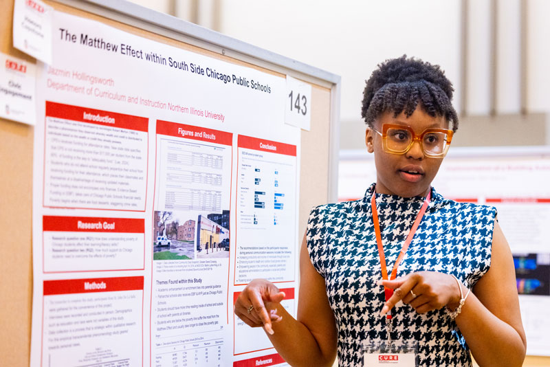 NIU student presenting research at CURE 