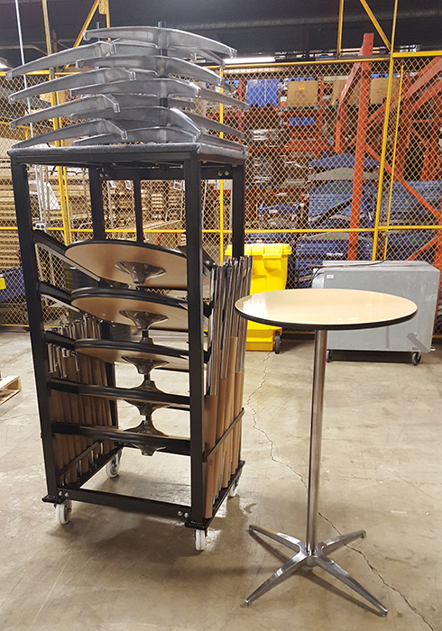 Stack cocktail tables with the table top on the cart rack and the base on top of the cart.