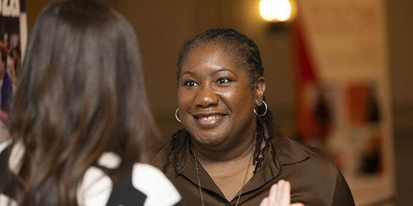 administration speaking to another individual