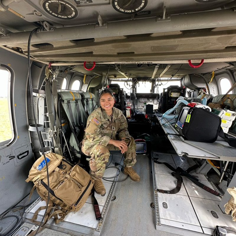 Mia on an airplane while serving in the Army National Guard